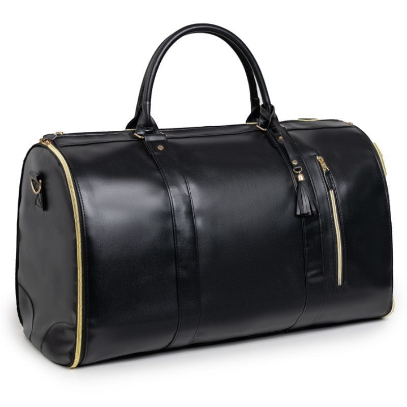 Waf Store Lebanon black waterproof PU leather garment duffel bag with gold zippers and a side tassel detail
