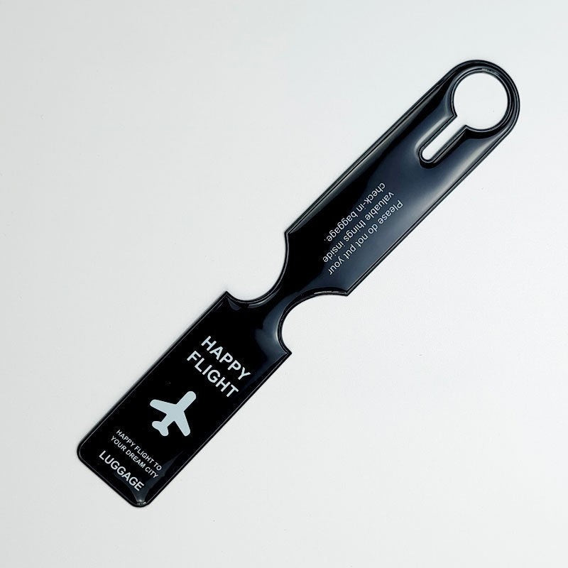 Waf Store Lebanon black flexible PVC luggage tag with Happy Flight airplane graphic and travel safety text