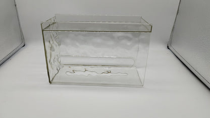 Waf Store Lebanon clear acrylic wall-mounted tissue box with a U-shaped opening for modern bathroom or kitchen decor.