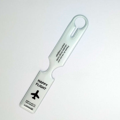 Waf Store Lebanon flexible clear PVC luggage tag featuring a black airplane icon and Happy Flight text