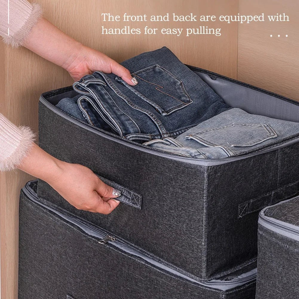 Waf Store Lebanon dark grey oxford fabric storage box with lid, zipper, and side handles holding folded denim jeans.