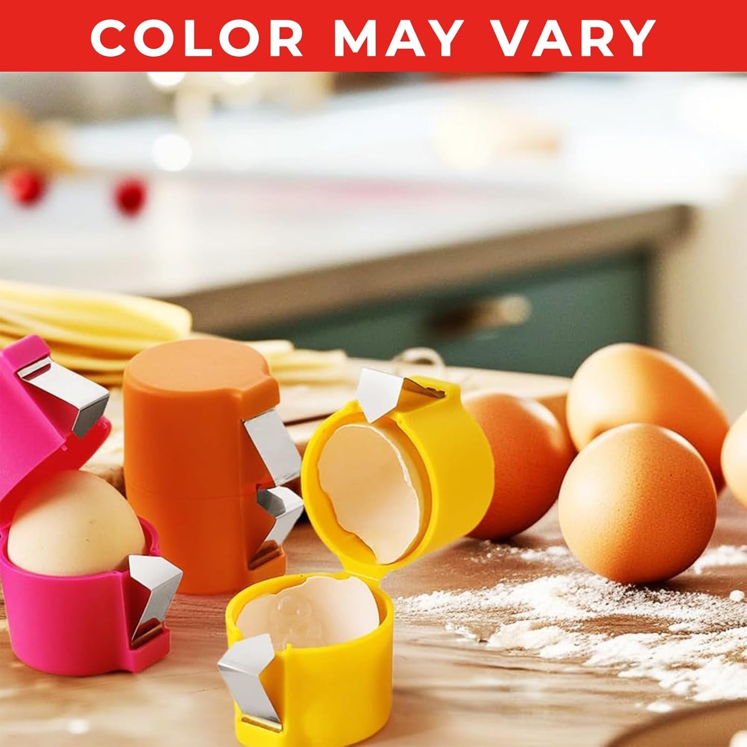 Waf Store Lebanon egg shell crackers in pink, orange, and yellow plastic with stainless steel blades on a kitchen table