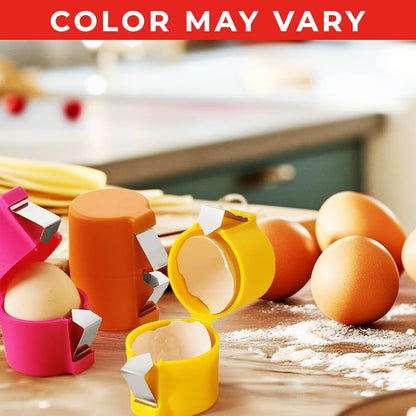 Waf Store Lebanon egg shell crackers in pink, orange, and yellow plastic with stainless steel blades on a kitchen table