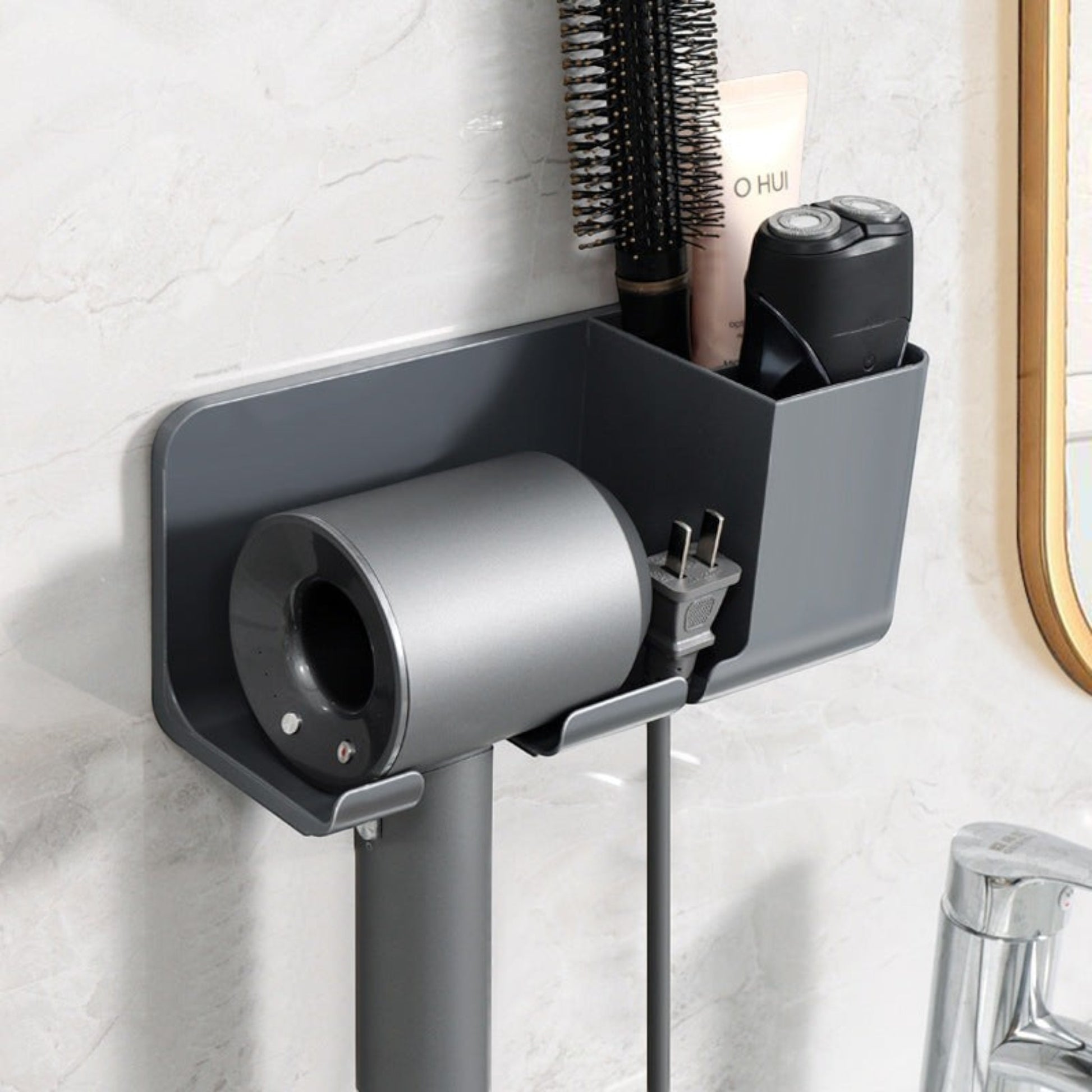 Waf Store Lebanon wall-mounted grey hair dryer holder with storage compartments for styling tools on a tiled wall.