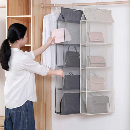 Waf Store Lebanon hanging handbag organizer with 4 mesh shelves in grey and beige, holding various purses in a closet.