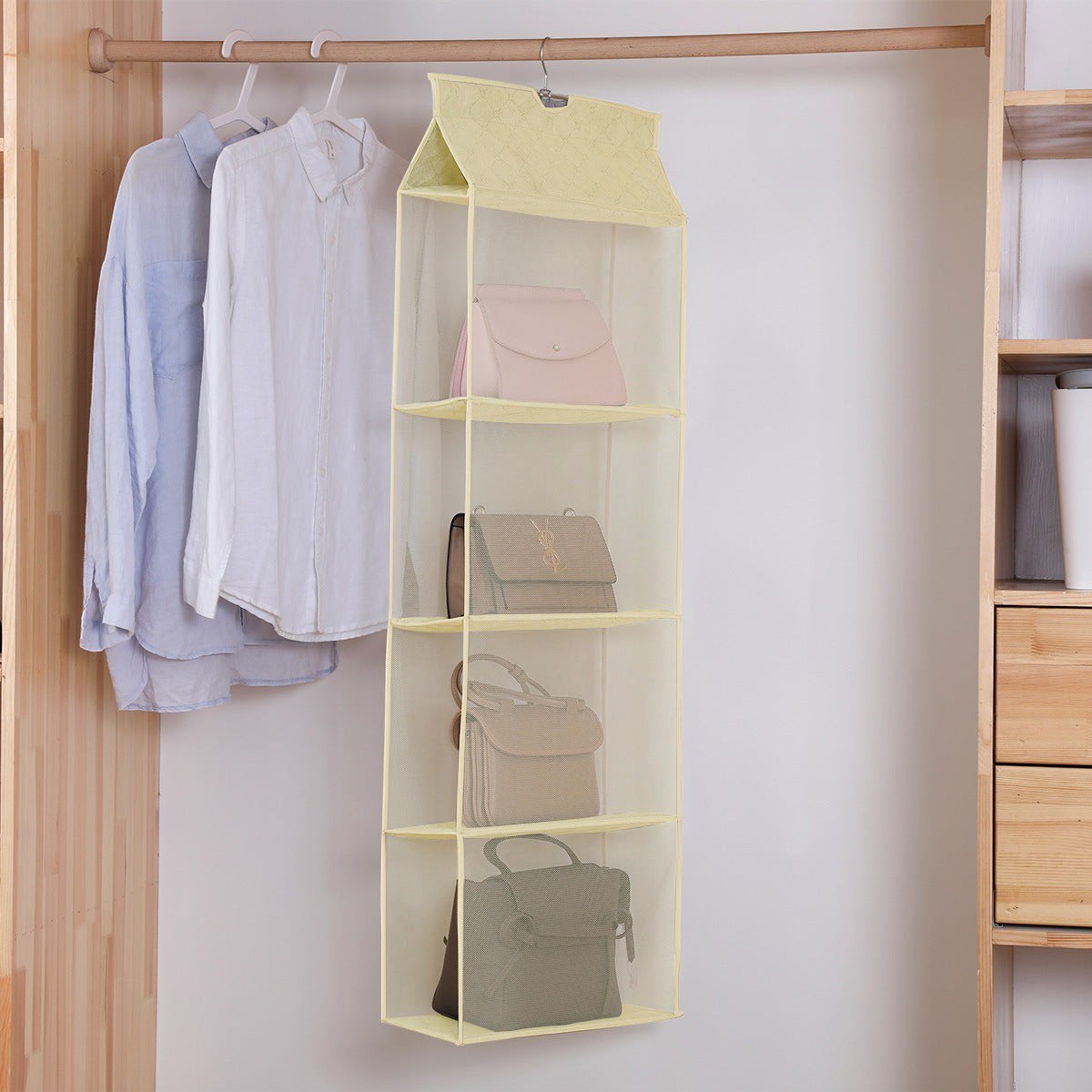 Waf Store Lebanon 4-tier hanging handbag organizer in pale yellow non-woven fabric and mesh for closet storage