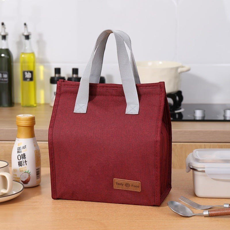 Waf Store Lebanon insulated lunch bag in burgundy cationic fabric with grey handles and leak-proof aluminum lining.