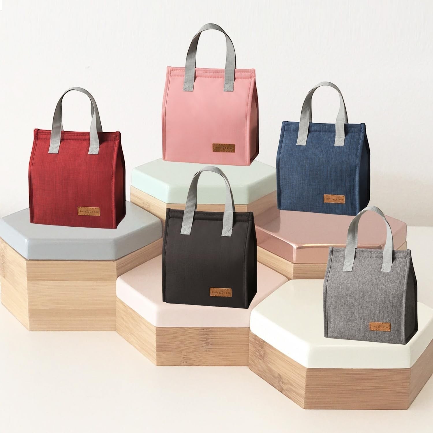 Waf Store Lebanon insulated lunch bags in various colors, made of durable cationic fabric with thermal lining.