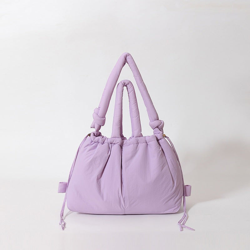 Waf Store Lebanon lavender nylon puffer tote bag with knotted handles and drawstring closure for versatile styling.