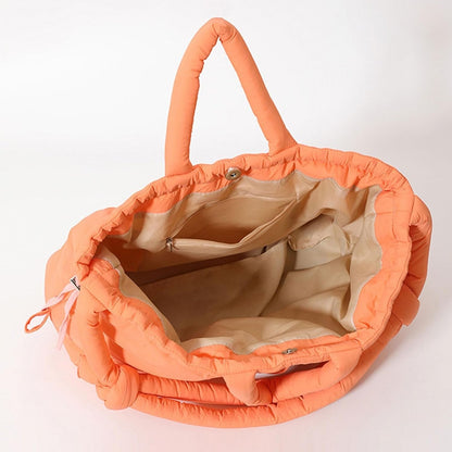 Waf Store Lebanon orange nylon puffer tote bag with quilted design, interior pockets, and convertible straps.