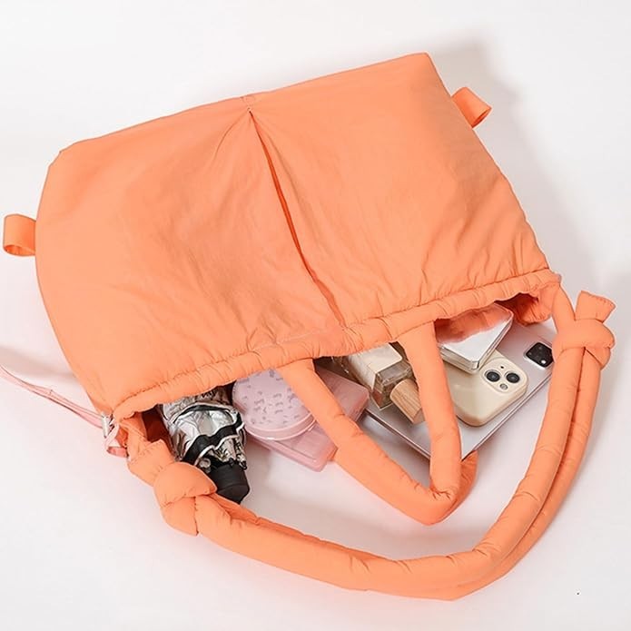 Waf Store Lebanon orange nylon puffer tote bag with internal organization for phone, cosmetics, and daily essentials.