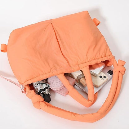 Waf Store Lebanon orange nylon puffer tote bag with internal organization for phone, cosmetics, and daily essentials.