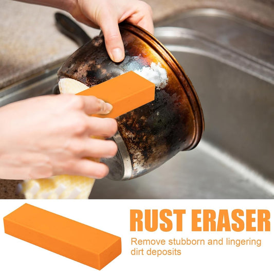 Waf Store Lebanon orange rubber rust eraser cleaning a burnt stainless steel pot bottom in a kitchen sink