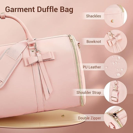 Waf Store Lebanon pink PU leather garment duffel bag with bow detail, shoulder strap, and gold zippers.