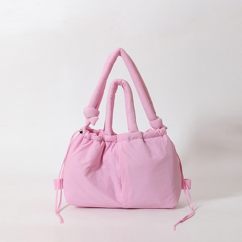 Waf Store Lebanon pink nylon puffer tote bag with drawstring closure and convertible shoulder straps.