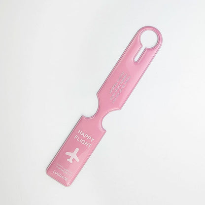 Waf Store Lebanon pink PVC luggage tag with Happy Flight airplane graphic and flexible loop for suitcase identification