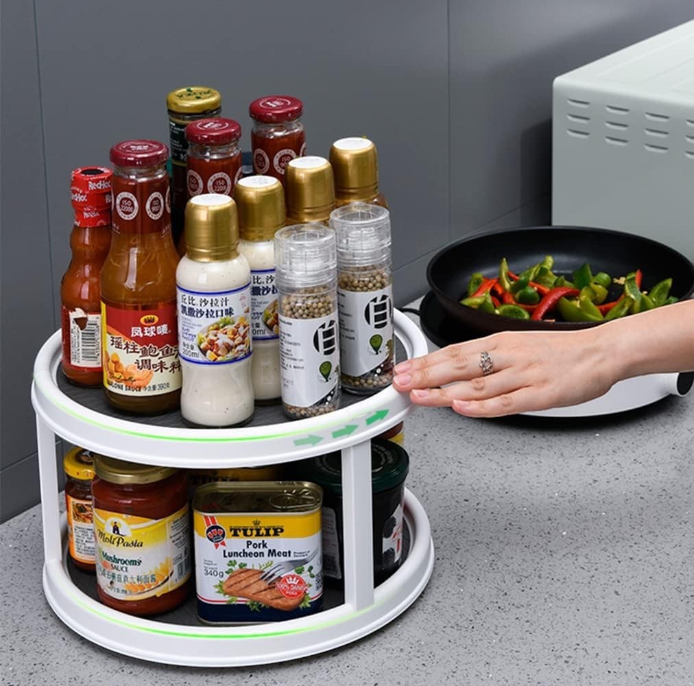 Waf Store Lebanon 2-tier rotating spice organizer with non-skid white plastic shelves holding various kitchen jars.