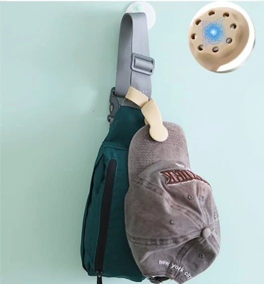 Waf Store Lebanon portable silicone hat clip attaching a baseball cap to a backpack and a straw hat to a bag.