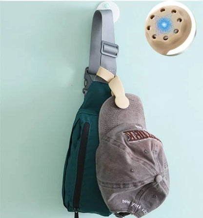 Waf Store Lebanon portable silicone hat clip attaching a baseball cap to a backpack and a straw hat to a bag.