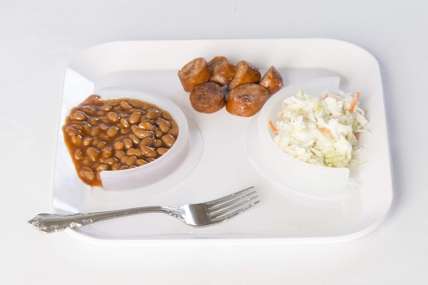 Waf Store Lebanon silicone food separators on a white plate keeping beans, sausage, and coleslaw separate