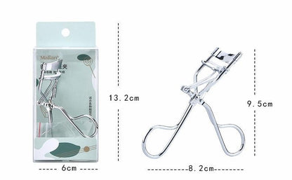 Waf Store Lebanon stainless steel eyelash curler with silicone pad and ergonomic handle shown with retail packaging