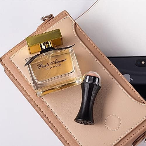 Waf Store Lebanon volcanic face roller and perfume bottle on a beige handbag for on-the-go oil control and touch-ups.