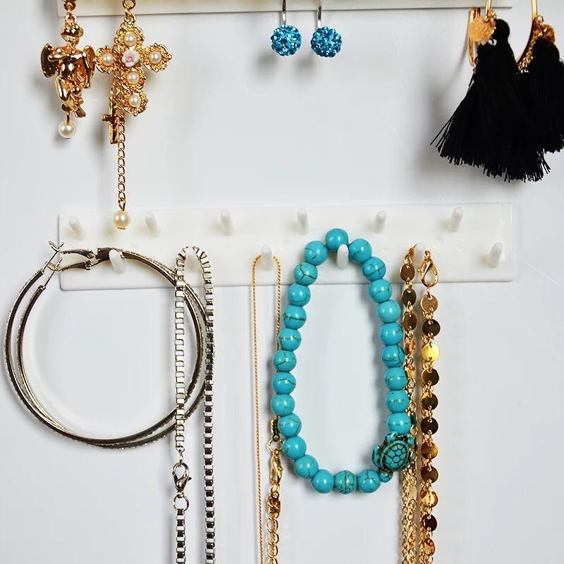Wall mounted jewelry hooks for rings and earrings