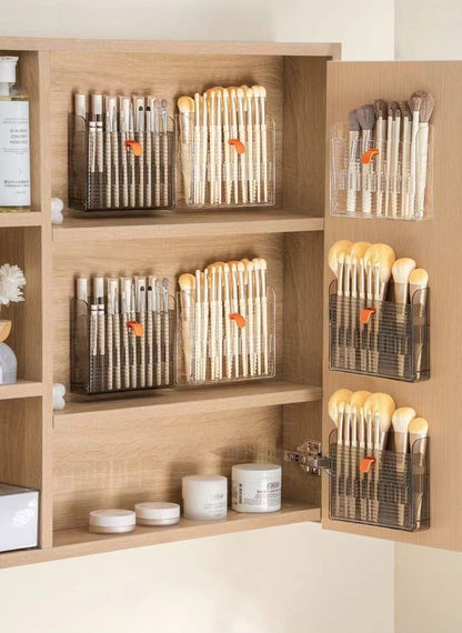 Wall organizer for toothbrushes and makeup brushes