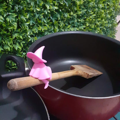 Witch lid lifter that keeps pots from boiling over