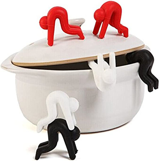 Heat-proof man lid holder that keeps pots from boiling over